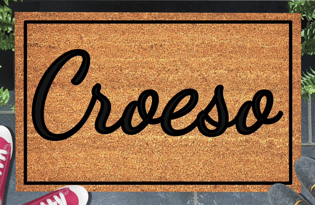 Welsh welcome mat in bold lettering, natural coir fiber, non-slip rubber backing