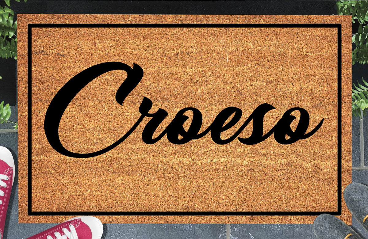 Close-up of Croeso doormat showing natural coir fiber texture and Welsh lettering detail