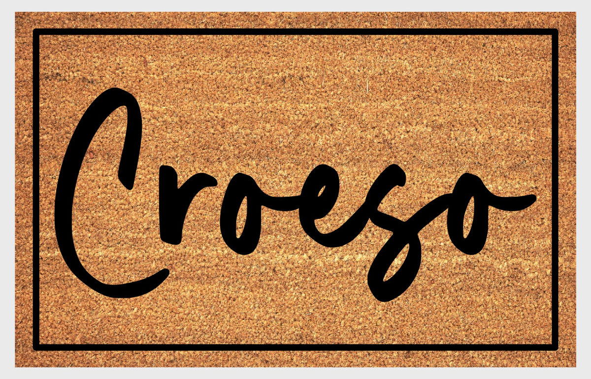 Close-up of Croeso Welsh doormat #2 showing natural coir fiber texture and lettering detail
