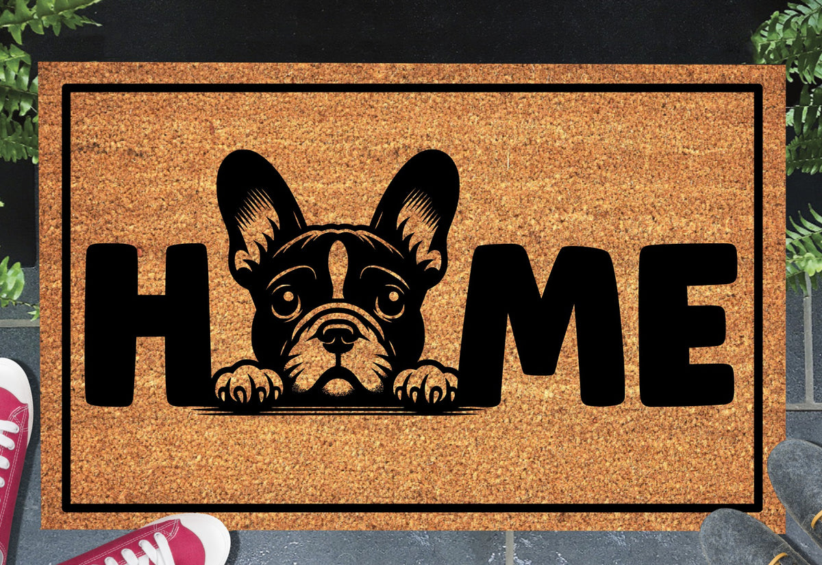 French Bulldog Doormat #1 Frenchie Welcome Mat coir doormat — French Bulldog illustration replacing the letter O in HOME, natural coir fiber, non-slip rubber backing, flat lay on dark background