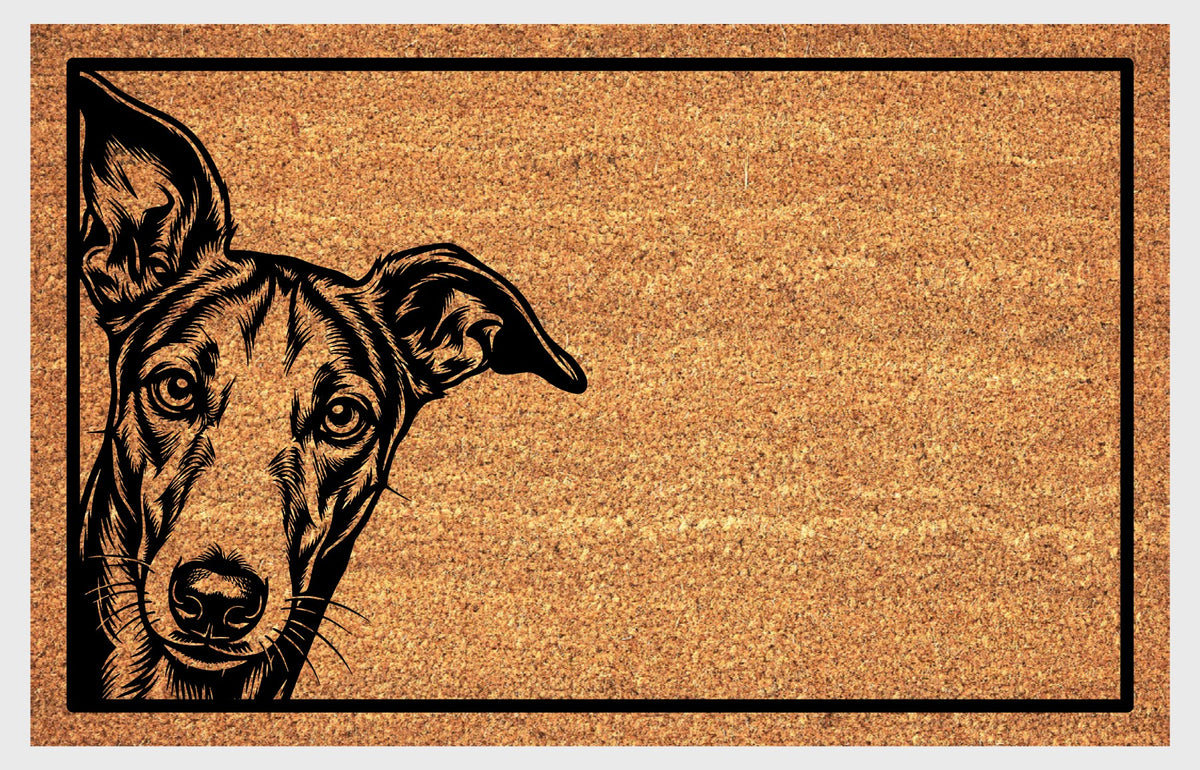 Galgo Peeking Doormat #1, front view of a Spanish Greyhound illustration with a long muzzle, expressive eyes and one raised ear inside a black rectangular border.