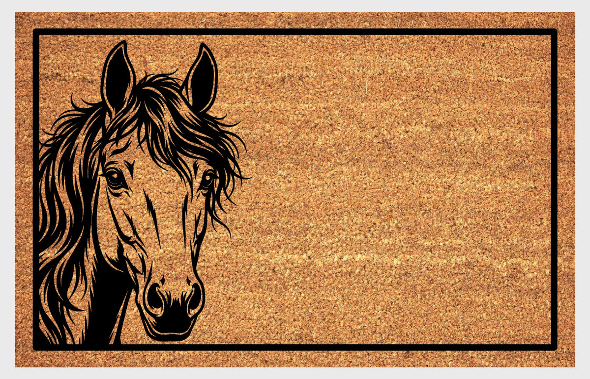 Mustang Horse peeking doormat in natural coir, featuring a black horse portrait peeking from the left edge with upright ears, expressive eyes and a flowing mane inside a black rectangular border, shown flat.