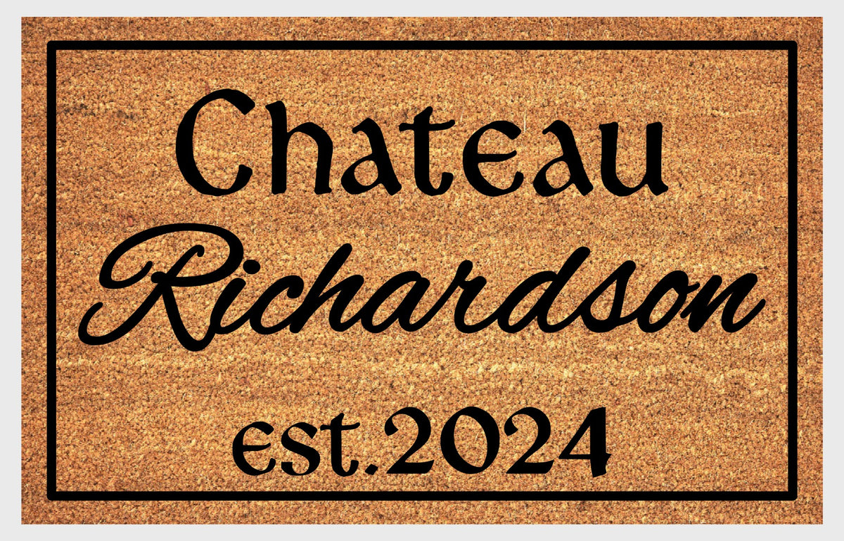 French Chateau personalized doormat showing Chateau lettering above the script family name and est. 2024 inside a black border.