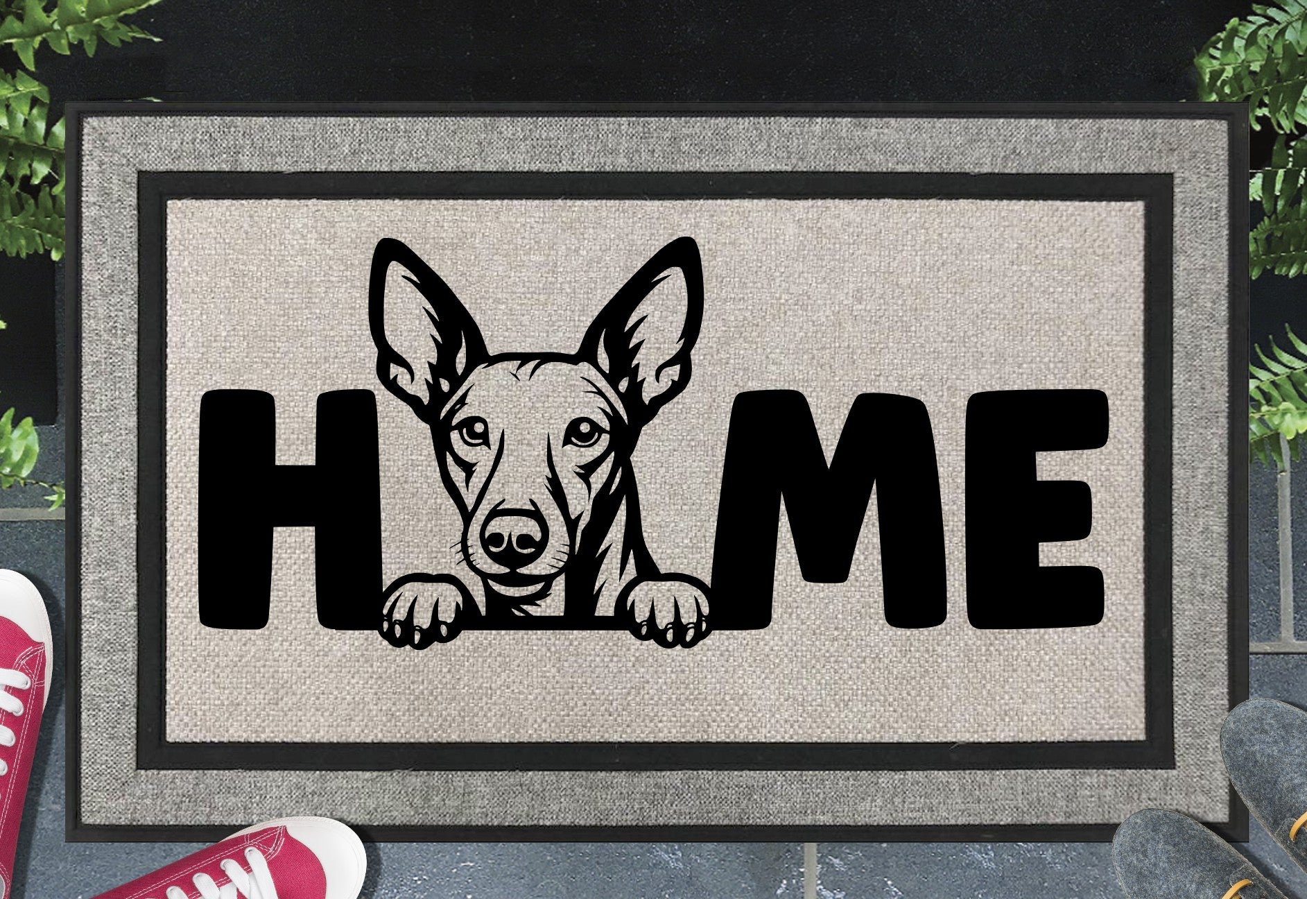 Podenco all-weather doormat #2 — Podenco illustration replaces the letter O in HOME, woven polyester linen-look finish, 18x30"