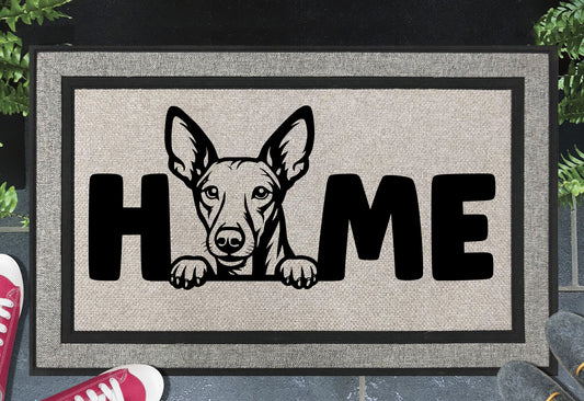 Podenco all-weather doormat #2 — Podenco illustration replaces the letter O in HOME, woven polyester linen-look finish, 18x30"