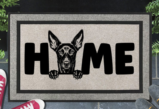 Podenco all-weather doormat #6 — Podenco illustration replaces the letter O in HOME, woven polyester linen-look finish, 18x30"
