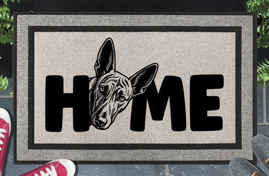 Podenco all-weather doormat #7 with Poddy illustration replacing the letter O in HOME — woven polyester welcome mat by Pupular Mats 