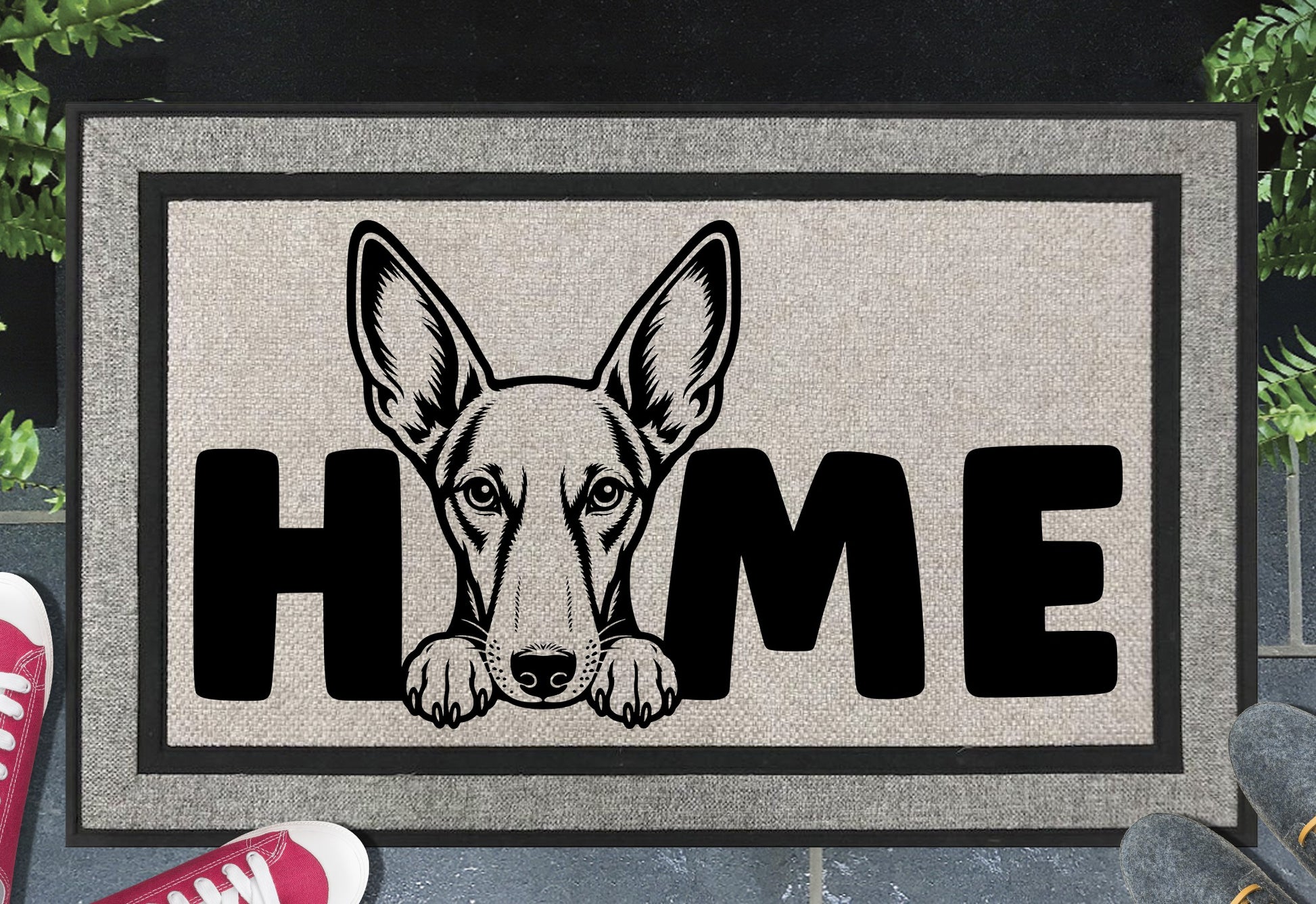 Podenco all-weather doormat #4 — Podenco illustration replaces the letter O in HOME, woven polyester linen-look finish, 18x30"