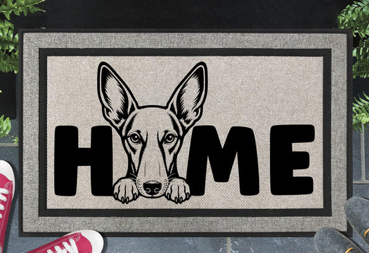 Podenco all-weather doormat #4 — Podenco illustration replaces the letter O in HOME, woven polyester linen-look finish, 18x30"