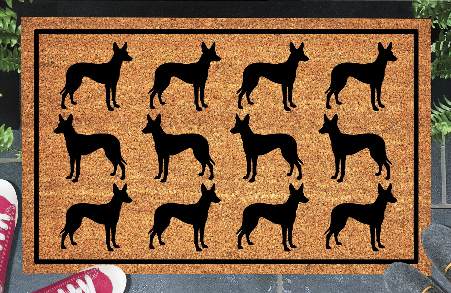 Podenco Parade coir doormat in a doorway setting — rows of Podenco silhouettes with large upright ears and lean athletic frame in a repeating pattern on a natural coir mat with black border