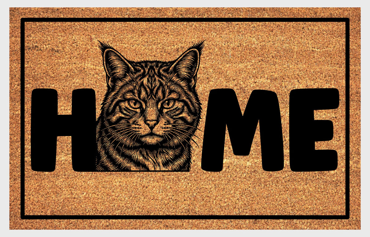 Scottish Wildcat coir doormat flat lay — Scottish Wildcat illustration replaces the letter O in HOME on natural coir