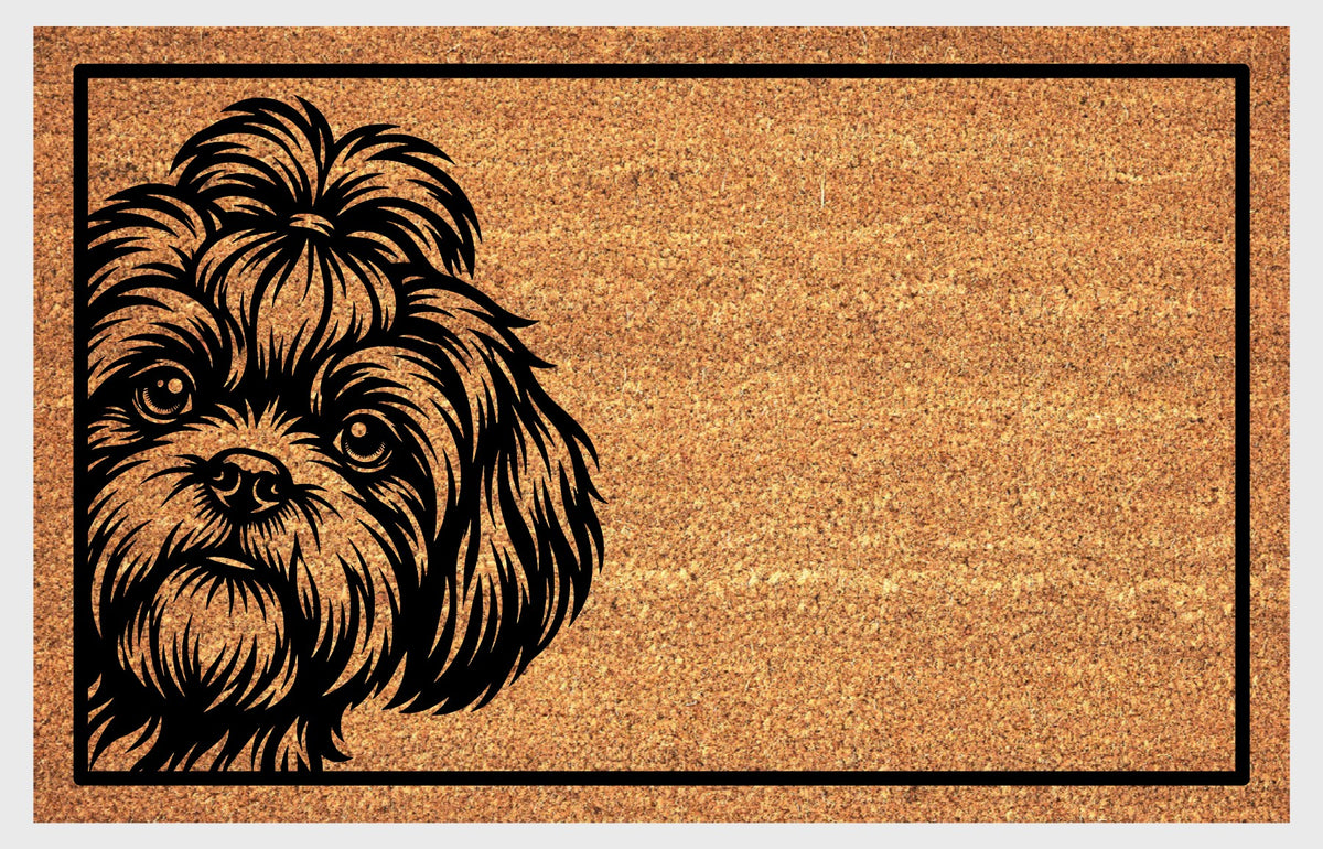 Shih Tzu Peeking Doormat #1, flat view of a Shih Tzu portrait with expressive eyes, a topknot and flowing facial hair on natural coir.