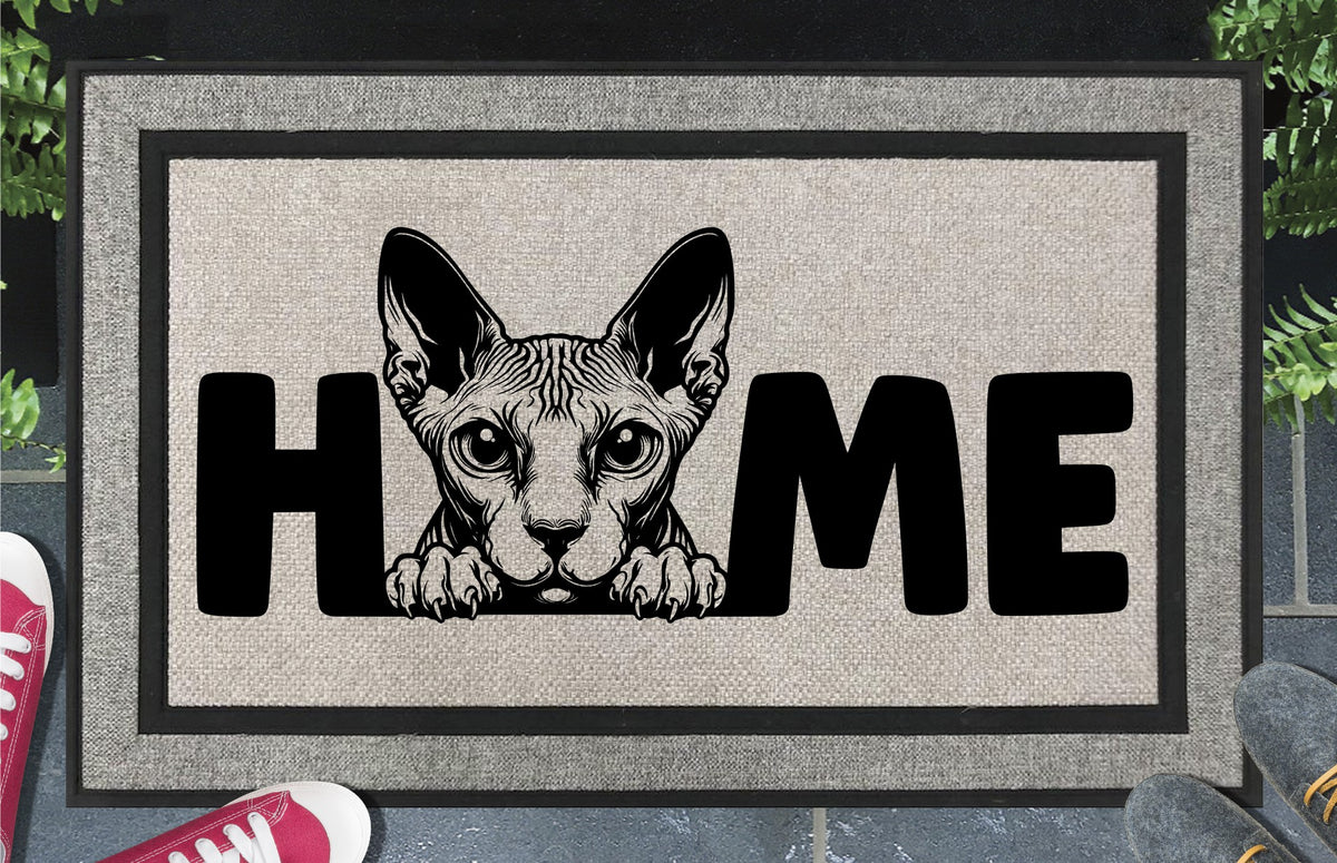 Sphynx Cat Doormat #3 all-weather lifestyle shot in doorway — Alien Cat O-replacement HOME design, low-chin wide-eyed portrait, woven polyester, 18x30