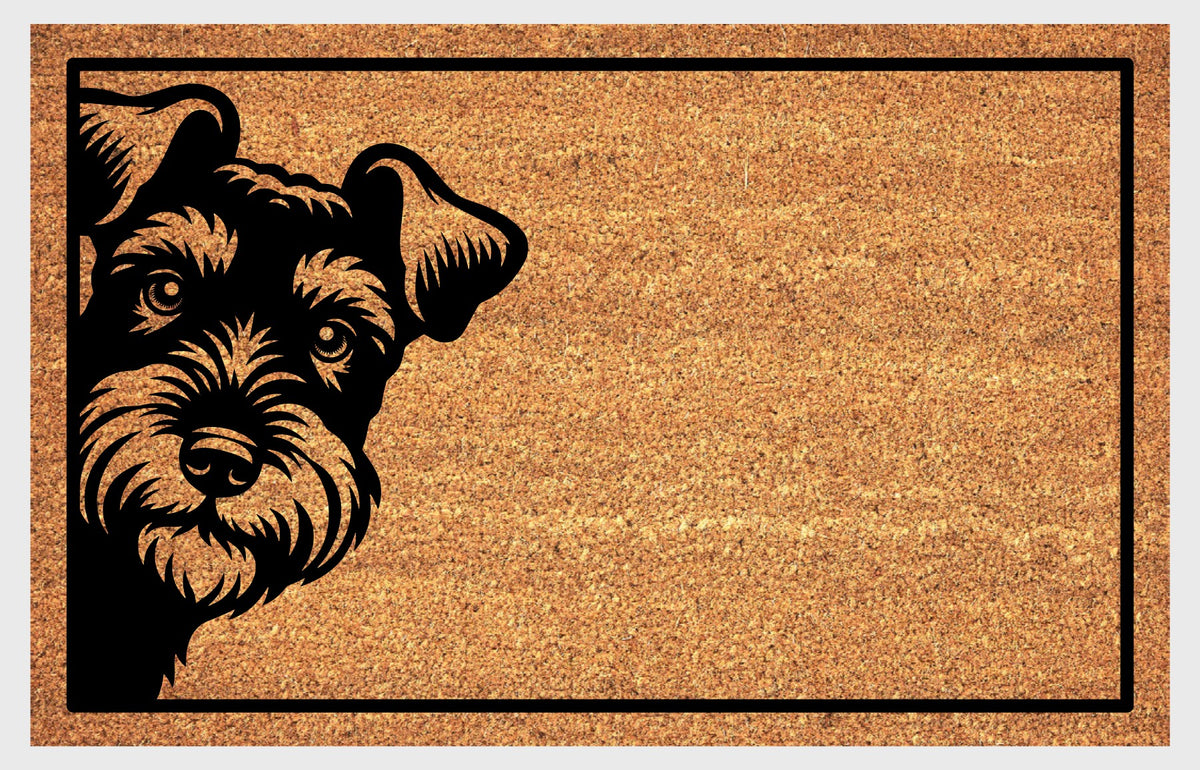 Welsh Terrier doormat showing a tilted head and expressive eyes and beard within a black rectangular border.