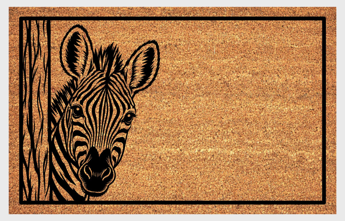 Zebra Peeking Doormat #2, flat view of a forward-facing Zebra with tall ears and bold facial stripes peeking around a wood-grain post on natural coir.
